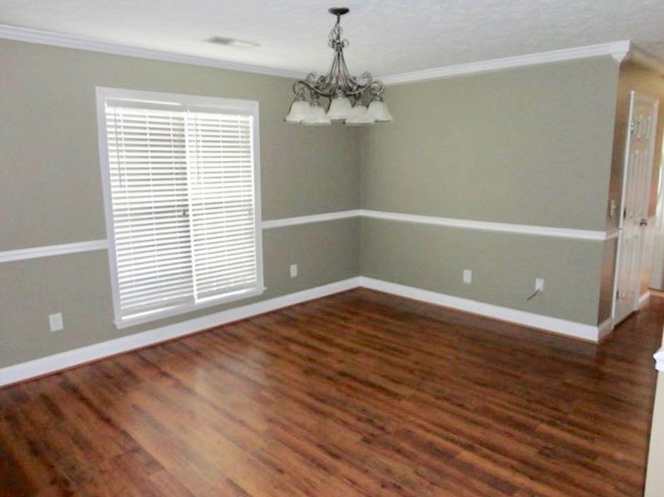 92 McLendon Road Fort Mitchell, AL 36856 - Photo 6 of 16 a view of a room with wooden floor and a window