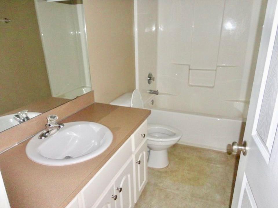 92 McLendon Road Fort Mitchell, AL 36856 - Photo 7 of 16 a bathroom with a sink and a mirror