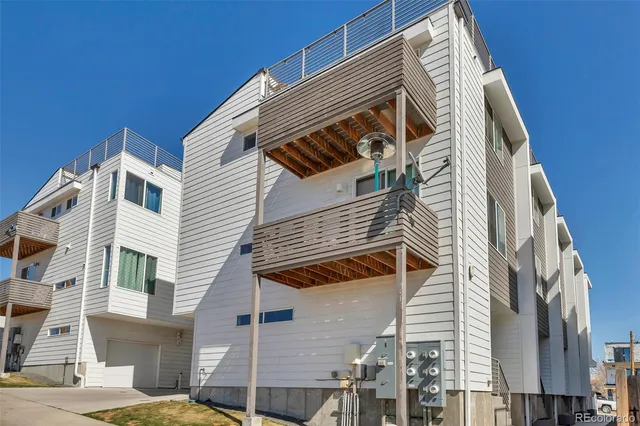 a view of a house with a garage