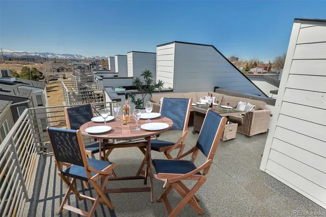a view of a terrace with furniture and stove