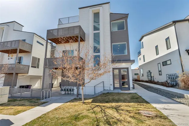 a view of a house with swimming pool