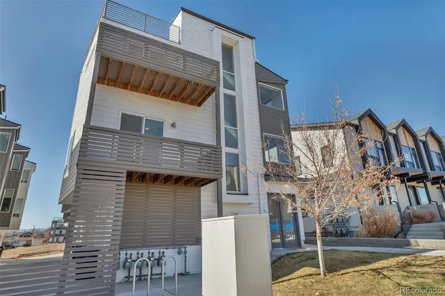 a front view of a house with street