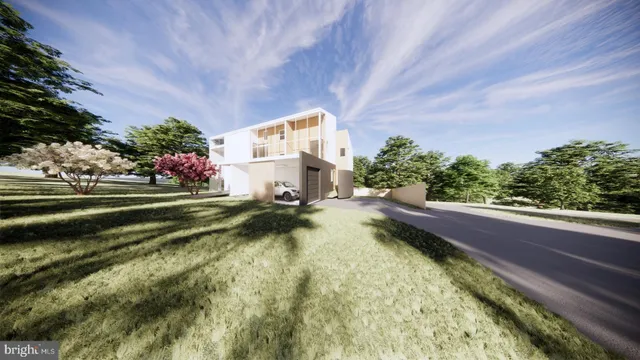 a view of a swimming pool with a yard and plants