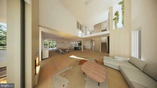 a view of a livingroom with furniture and a entryway