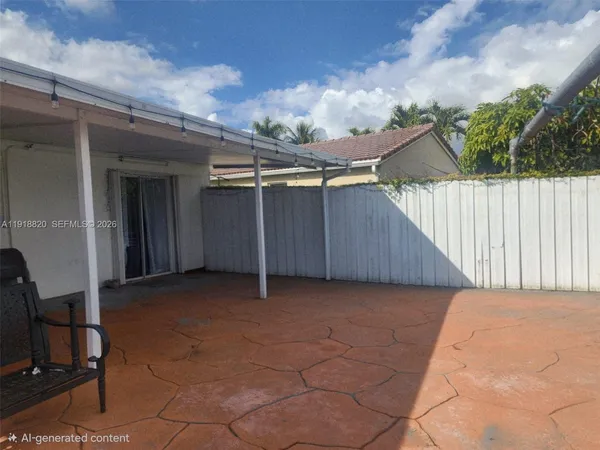 a view of backyard with cabin