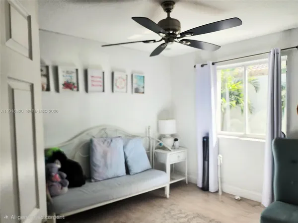 a living room with furniture and a window