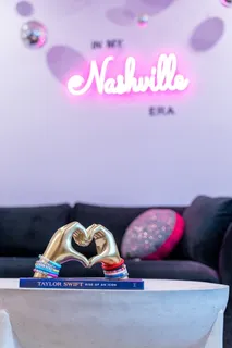 a bedroom with bed and wooden floor