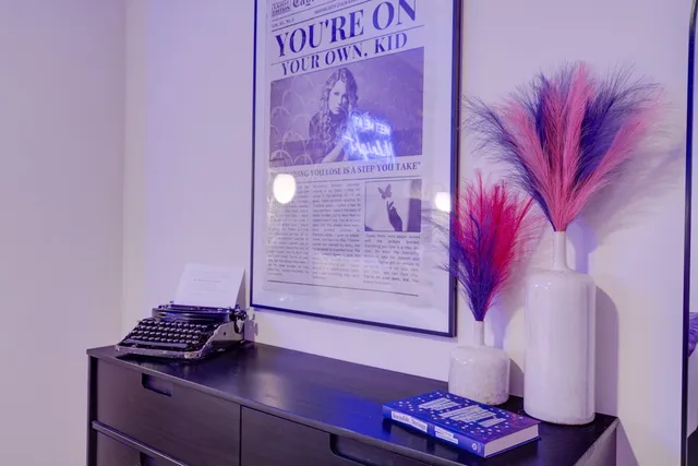 a sign board with a wooden door