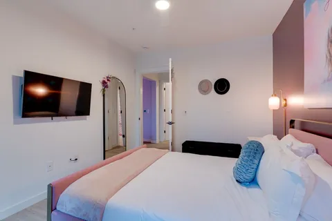 a view of a living room with furniture