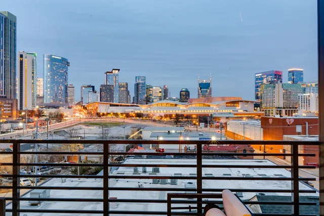 a outdoor living space with patio furniture and potted plants