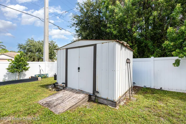 a backyard of a house with seating space