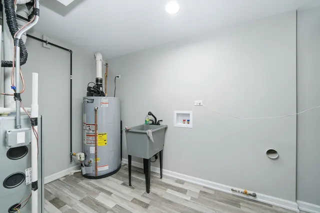 a view of a street with wooden fence