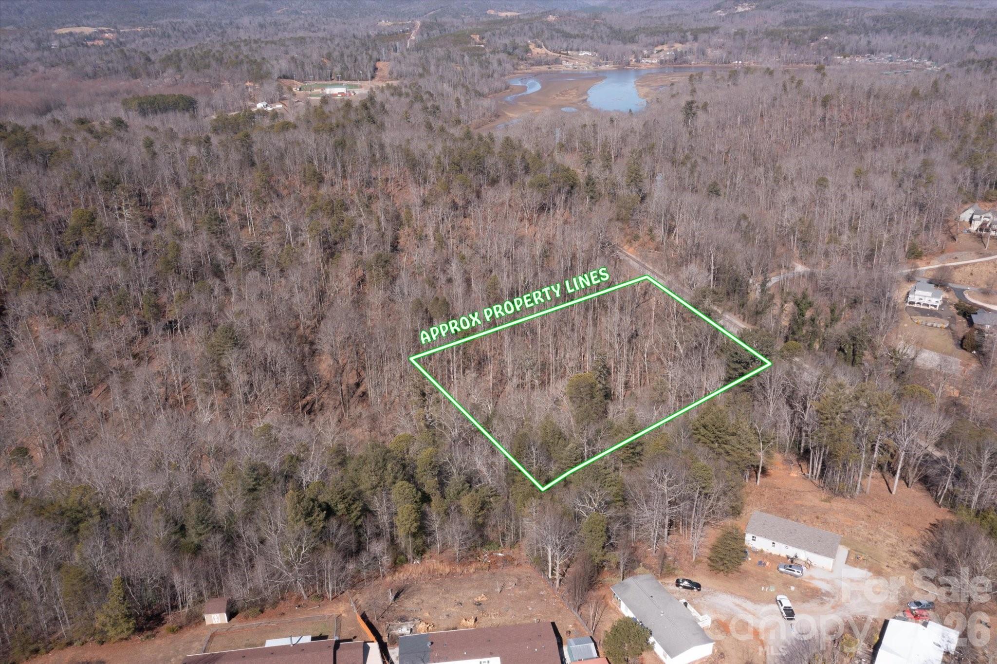 V/l V/l Ridge Walk Road, Unit 16 Marion, NC 28752 - Photo 5 of 10 a bird view of a backyard