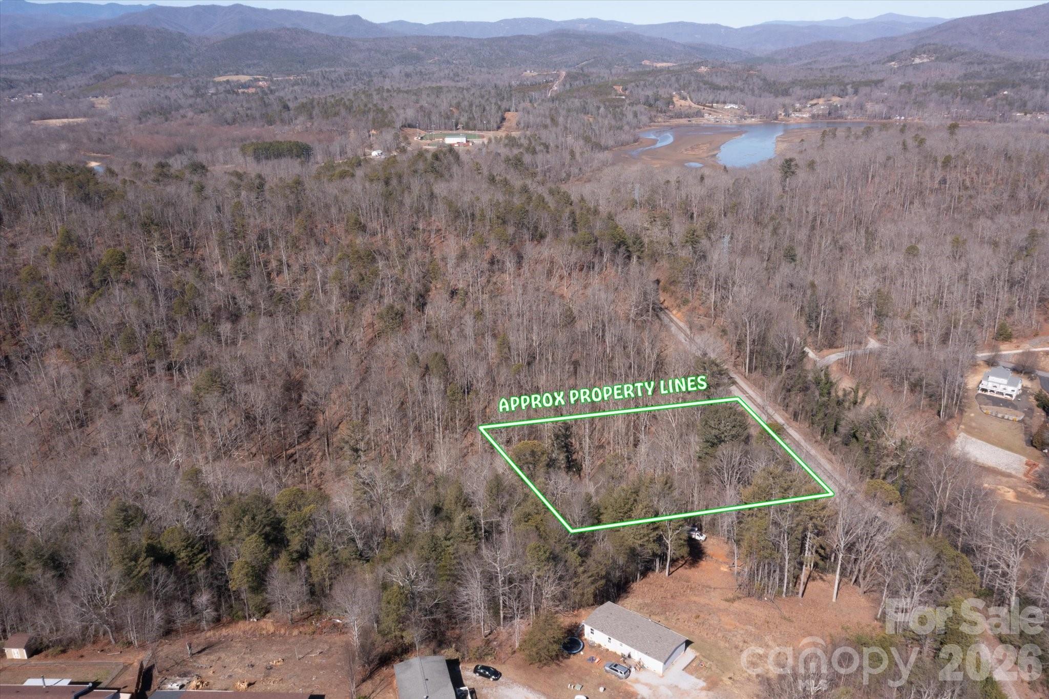 V/l V/l Ridge Walk Road, Unit 16 Marion, NC 28752 - Photo 6 of 10 an aerial view of house with yard