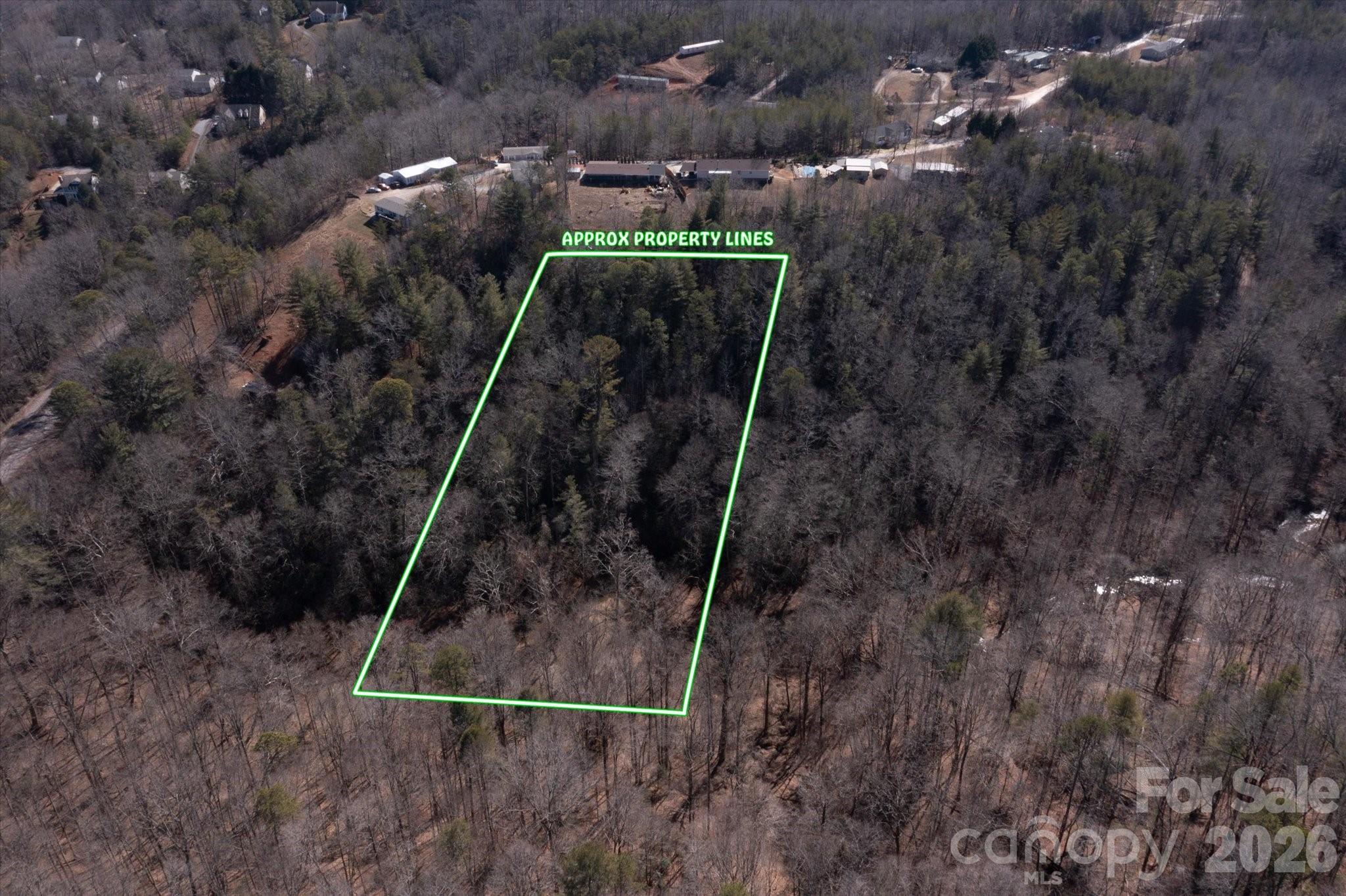 V/l V/l Ridge Walk Road, Unit 16 Marion, NC 28752 - Photo 7 of 10 a view of a backyard