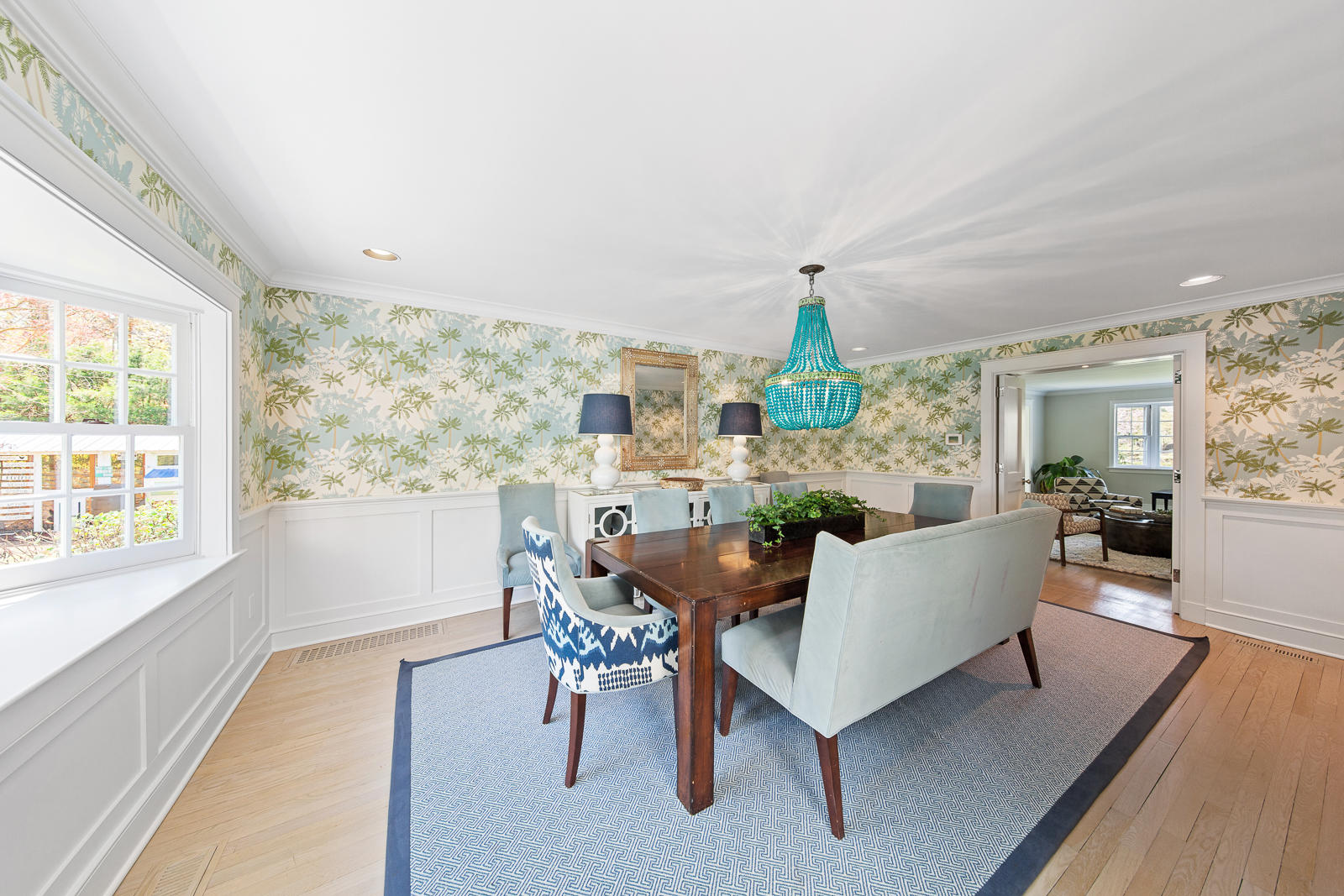 27 Searles Road Darien, CT 06820 - Photo 11 of 56 a living room with furniture and a large window