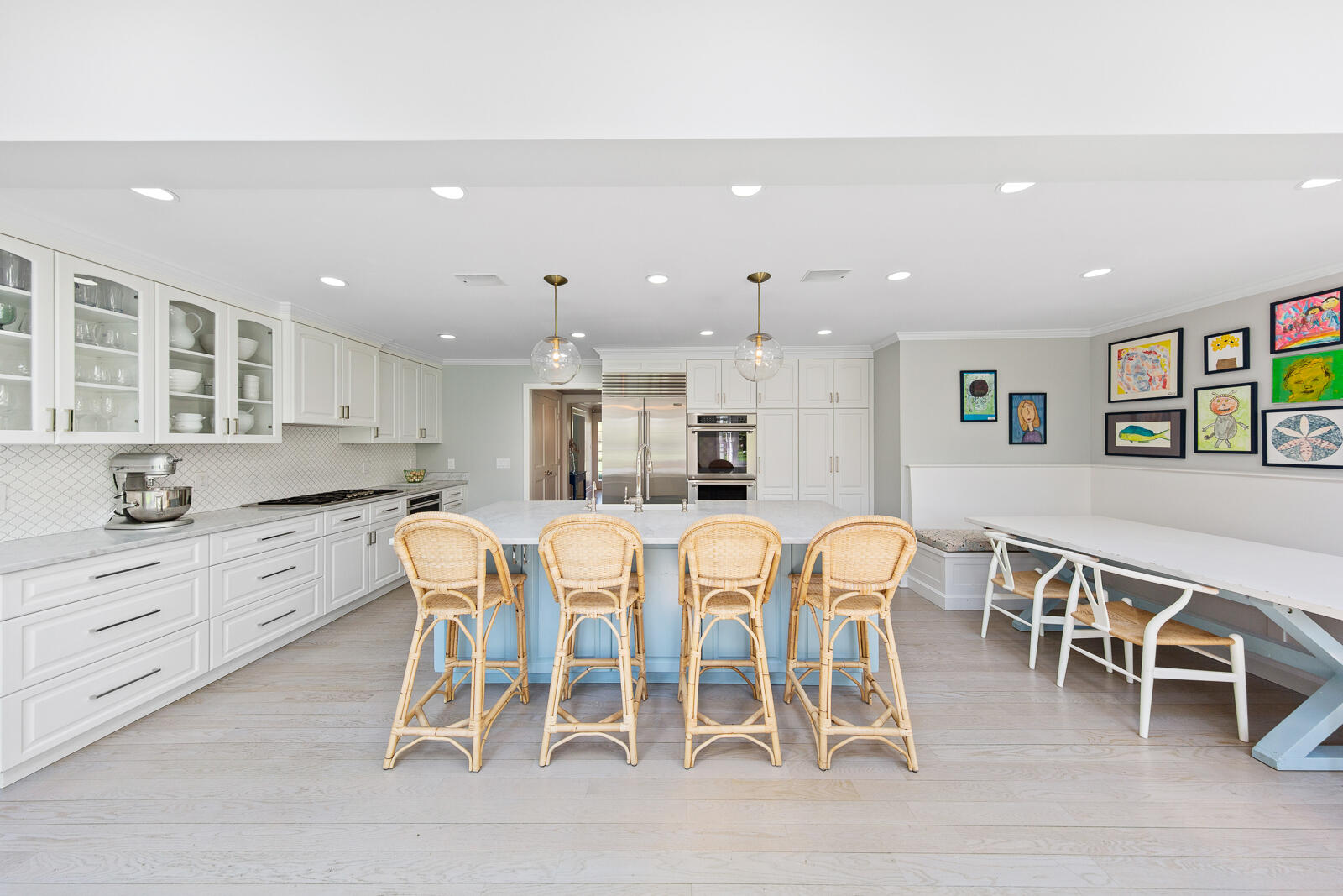 27 Searles Road Darien, CT 06820 - Photo 12 of 56 a large kitchen with a table and chairs