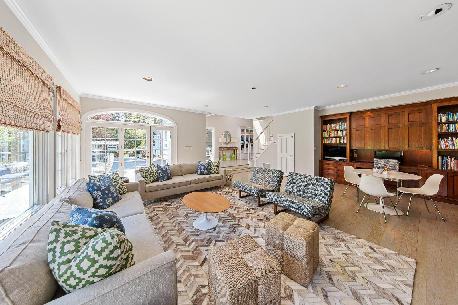 27 Searles Road Darien, CT 06820 - Photo 20 of 56 a living room with furniture large windows and wooden floor