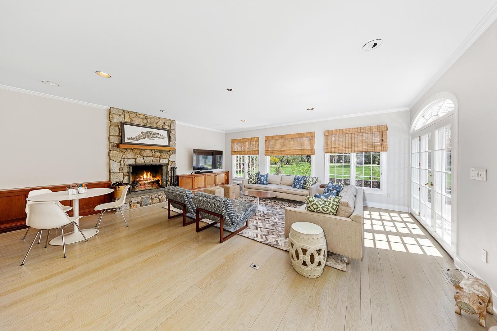 27 Searles Road Darien, CT 06820 - Photo 21 of 56 a living room with furniture and a table