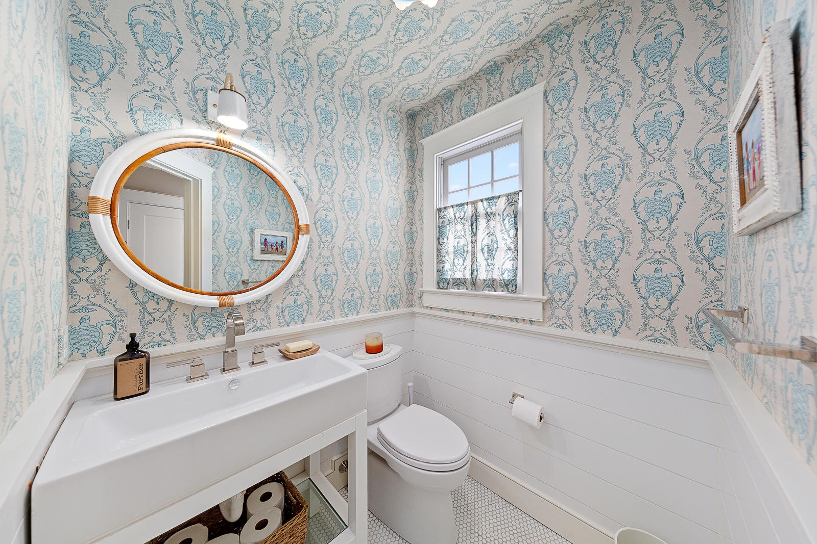 27 Searles Road Darien, CT 06820 - Photo 24 of 56 a bathroom with a sink a toilet and a mirror