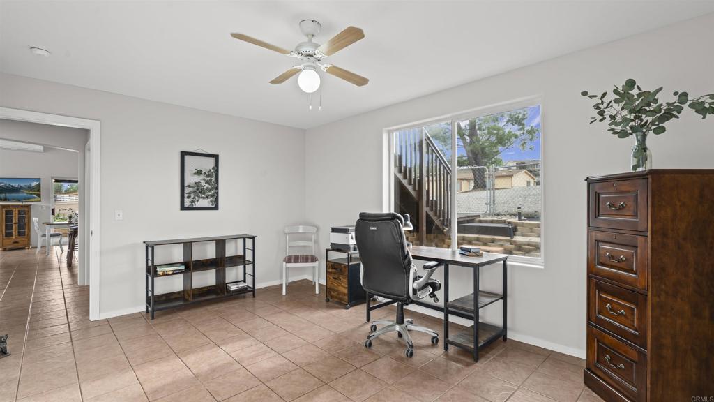 39260 Grassy Road Temecula, CA 92592 - Photo 11 of 50 a view of a workspace with furniture and a window