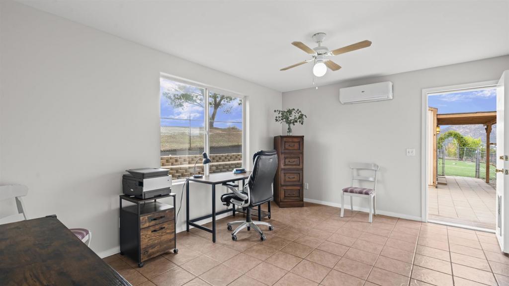 39260 Grassy Road Temecula, CA 92592 - Photo 12 of 50 a workspace with furniture and a window