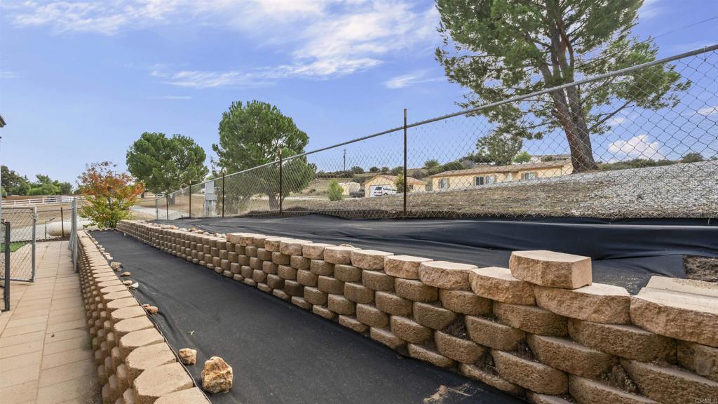 39260 Grassy Road Temecula, CA 92592 - Photo 18 of 53 a view of a chairs and table on the balcony