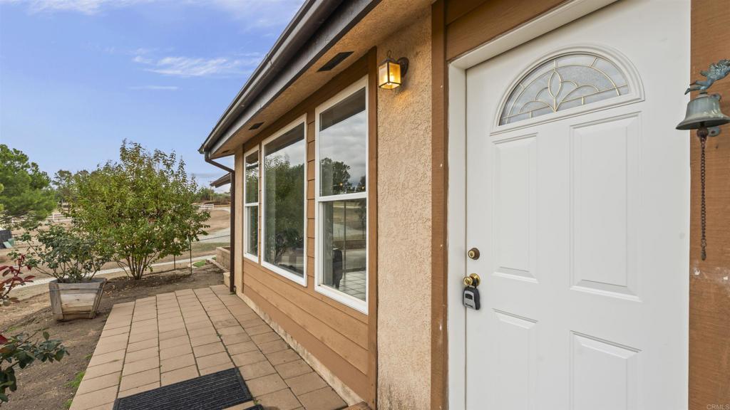 39260 Grassy Road Temecula, CA 92592 - Photo 35 of 50 a view of a house with a backyard