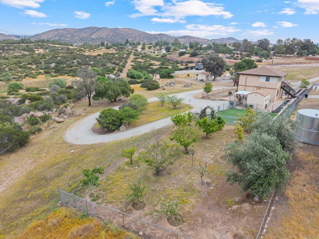 39260 Grassy Road Temecula, CA 92592 - Photo 39 of 53 an aerial view of residential houses with outdoor space and trees