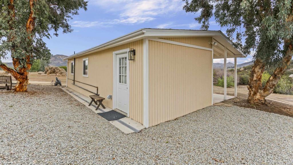 39260 Grassy Road Temecula, CA 92592 - Photo 44 of 50 a view of a house with a backyard