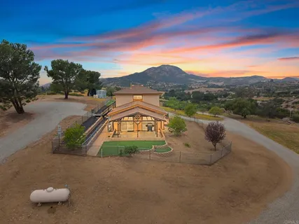 an aerial view of residential building with parking space