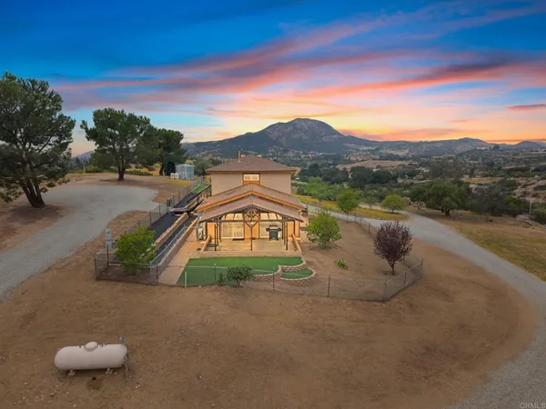 an aerial view of residential building with parking space
