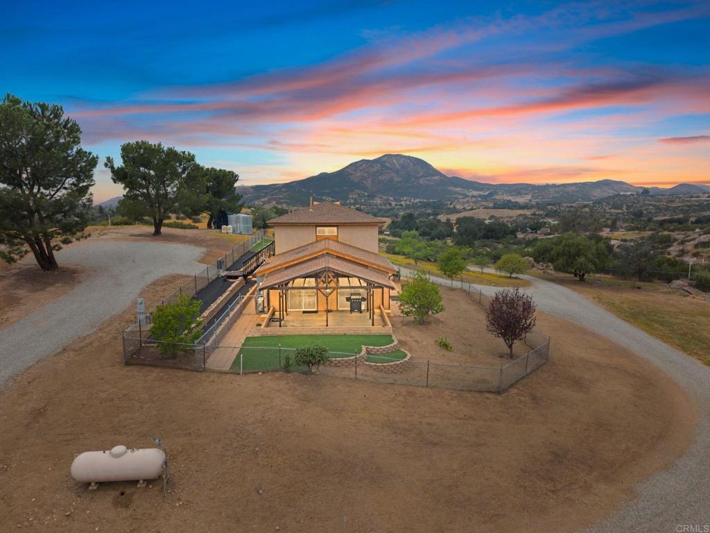 39260 Grassy Road Temecula, CA 92592 - Photo 43 of 53 a view of a street with a yard