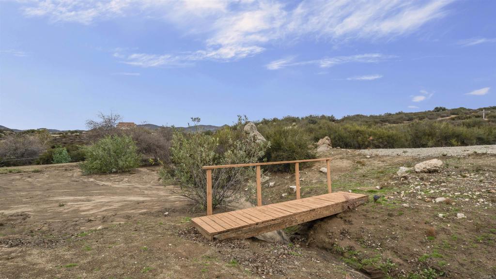 39260 Grassy Road Temecula, CA 92592 - Photo 47 of 50 a view of a lake with a mountain