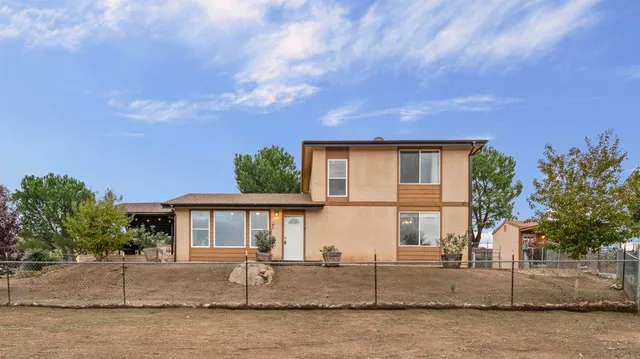 front view of house with a yard