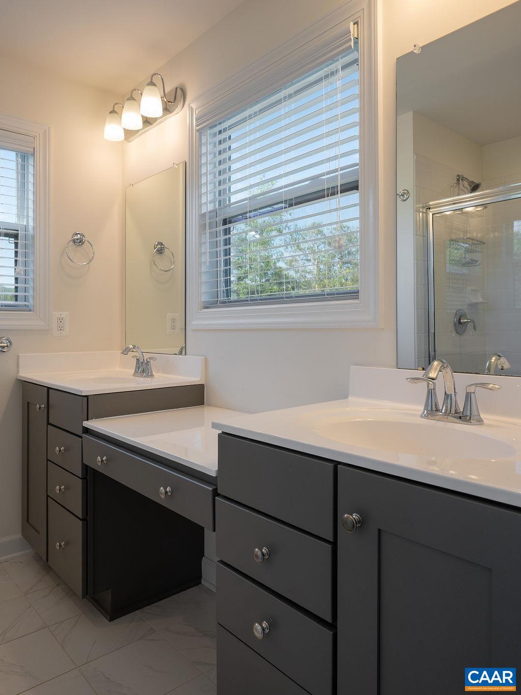 148 Junction Lane Charlottesville, VA 22902 - Photo 14 of 29 a bathroom with a sink double vanity and a mirror