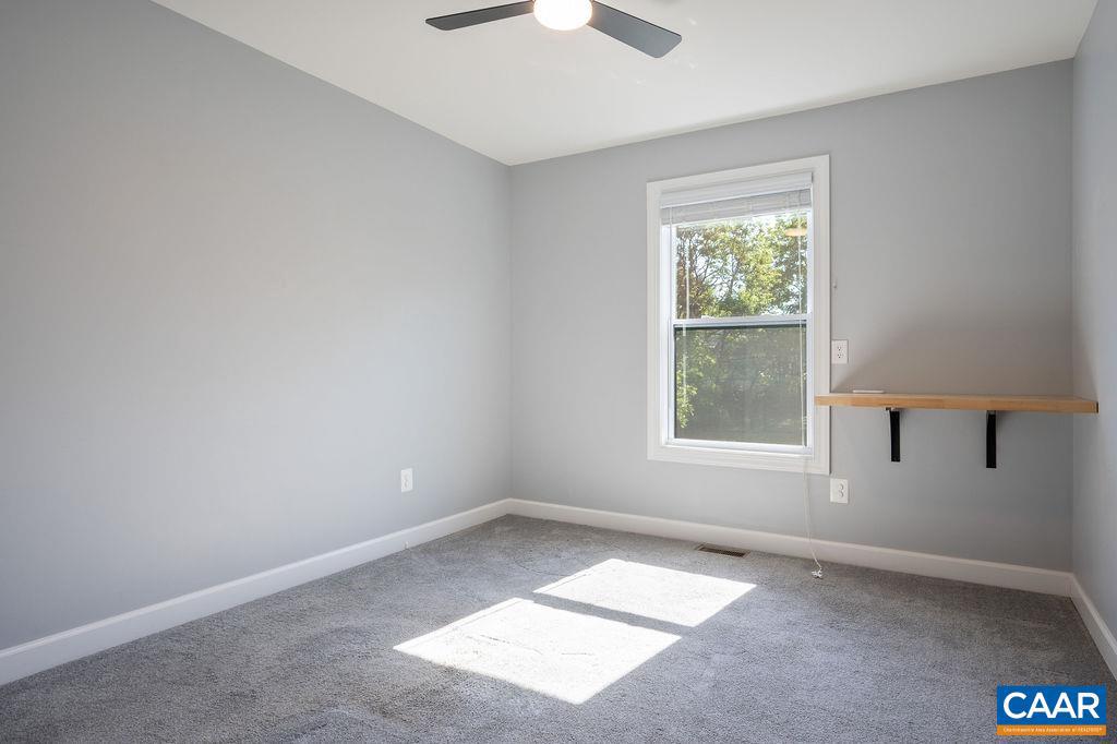 148 Junction Lane Charlottesville, VA 22902 - Photo 17 of 29 an empty room with a window
