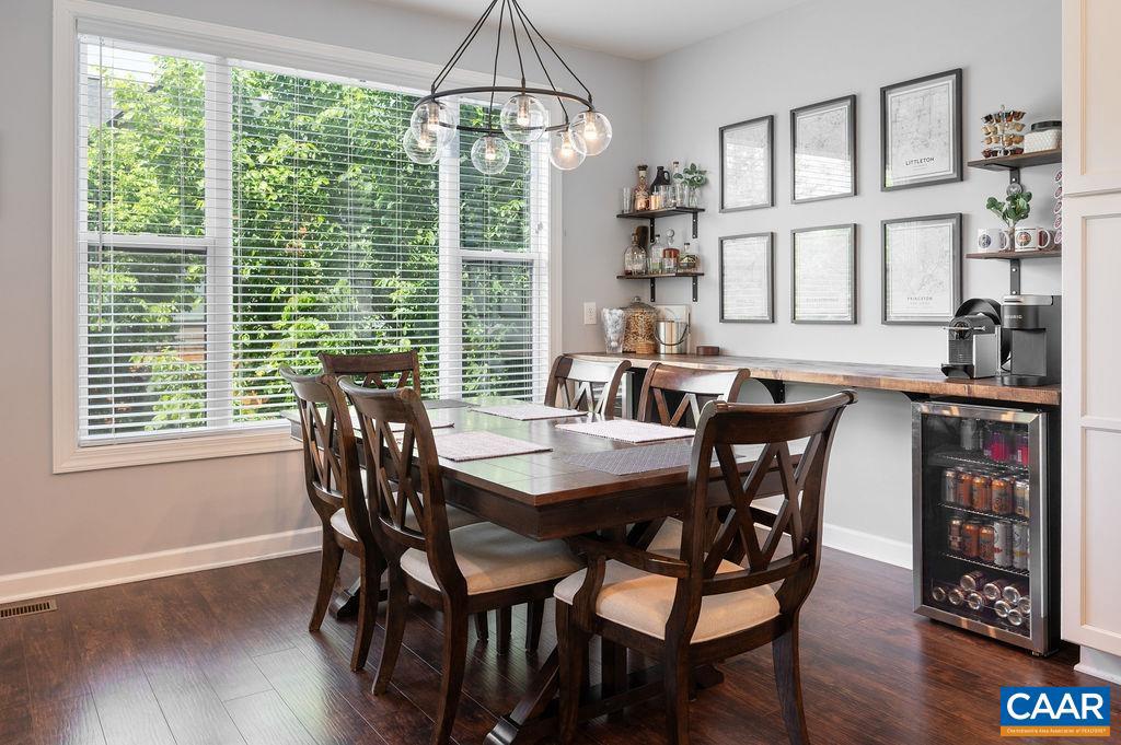 148 Junction Lane Charlottesville, VA 22902 - Photo 6 of 29 a view of a dining room with furniture window and wooden floor