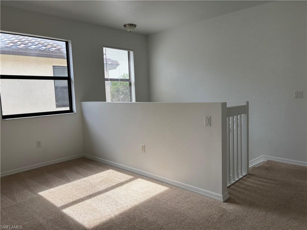 5414 Ferris Avenue Ave Maria, FL 34142 - Photo 9 of 15 Unfurnished room with light carpet