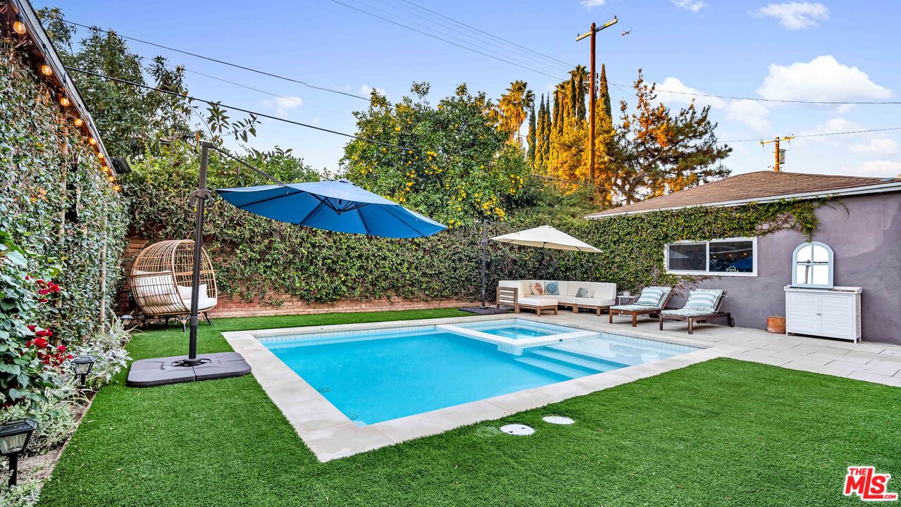 6557 Ruffner Avenue Lake Balboa, CA 91406 - Photo 18 of 31 a view of a house with a yard patio and sitting area