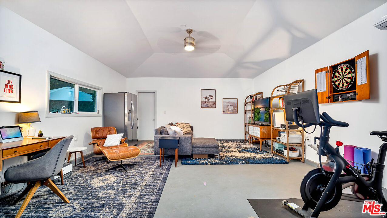 6557 Ruffner Avenue Lake Balboa, CA 91406 - Photo 30 of 31 a living room with furniture and a rug