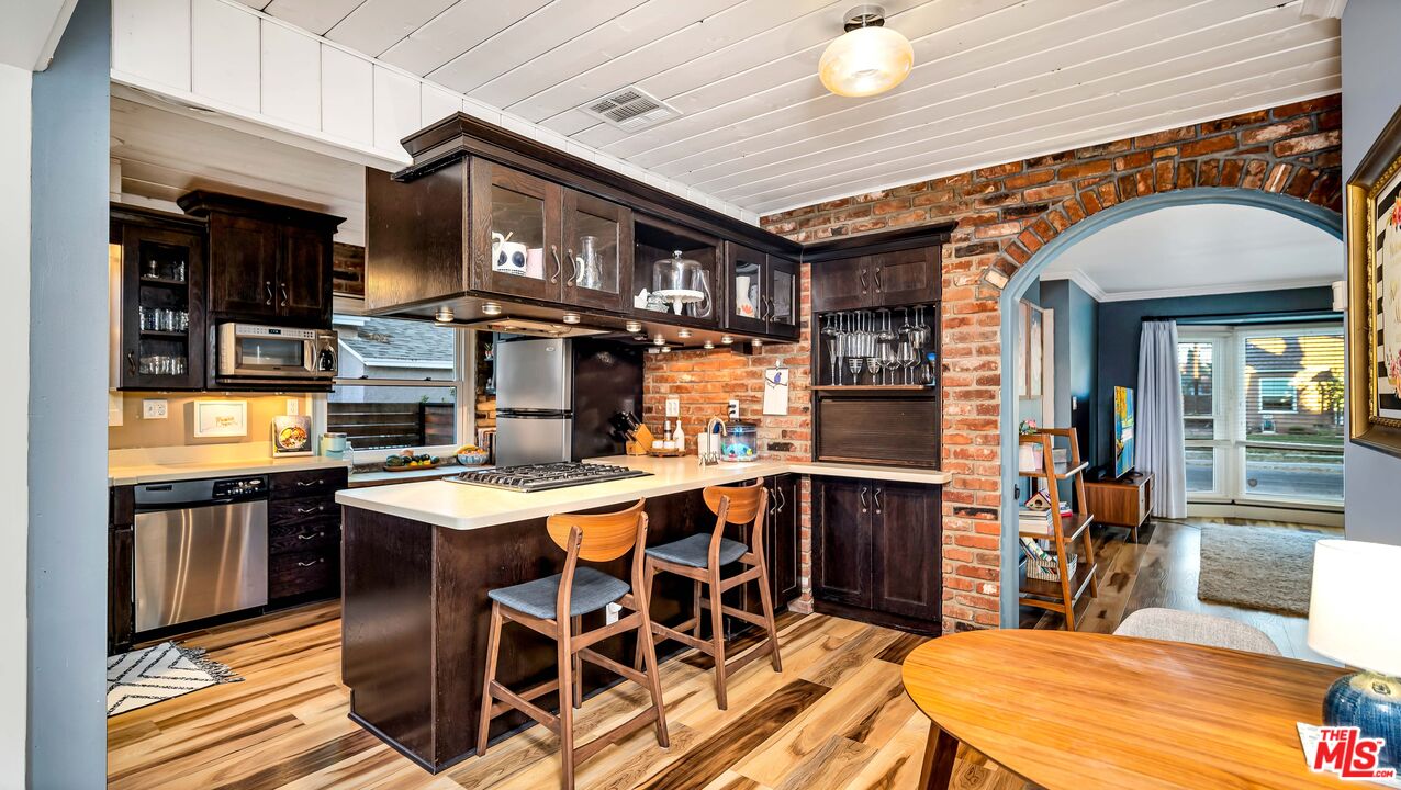 6557 Ruffner Avenue Lake Balboa, CA 91406 - Photo 4 of 31 a view of a dining room with furniture