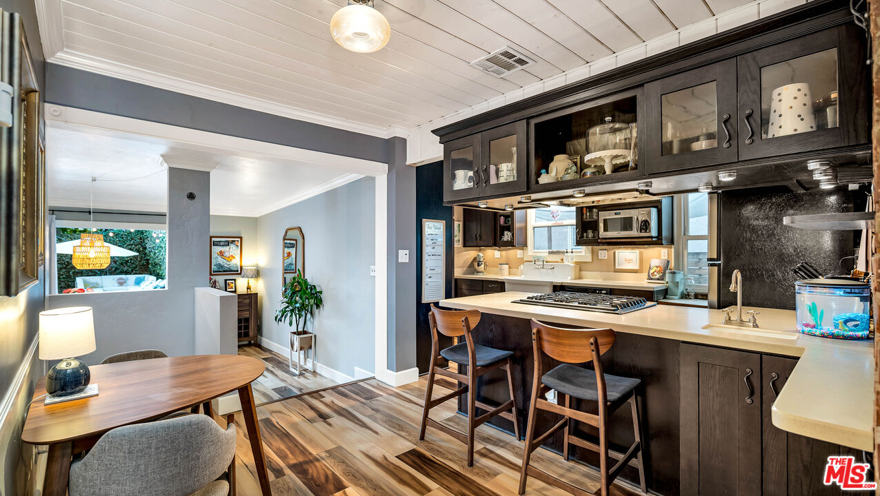 6557 Ruffner Avenue Lake Balboa, CA 91406 - Photo 5 of 31 a view of a dining room with furniture