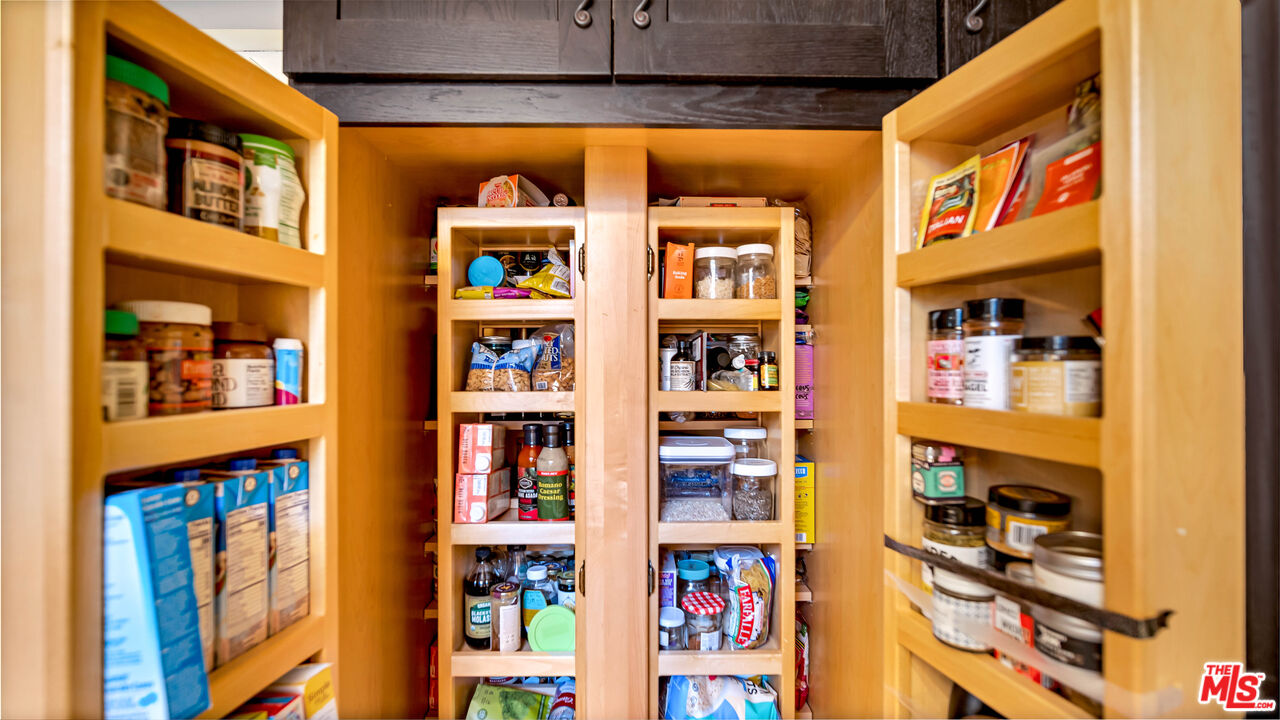 6557 Ruffner Avenue Lake Balboa, CA 91406 - Photo 6 of 31 a view of a store room with shelves