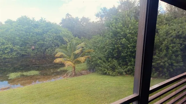 a view of a lake from a window