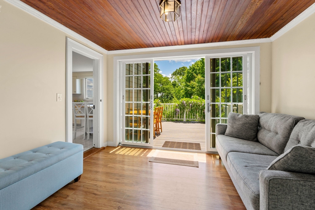 107 Stoneleigh Road Watertown, MA 02472 - Photo 16 of 42 a living room with furniture and a large window