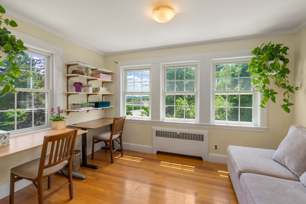 107 Stoneleigh Road Watertown, MA 02472 - Photo 22 of 42 a view of a livingroom with furniture and a window