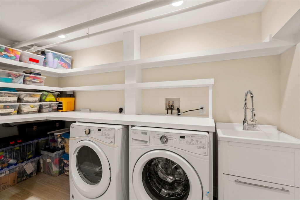 107 Stoneleigh Road Watertown, MA 02472 - Photo 40 of 42 a utility room with dryer and washer