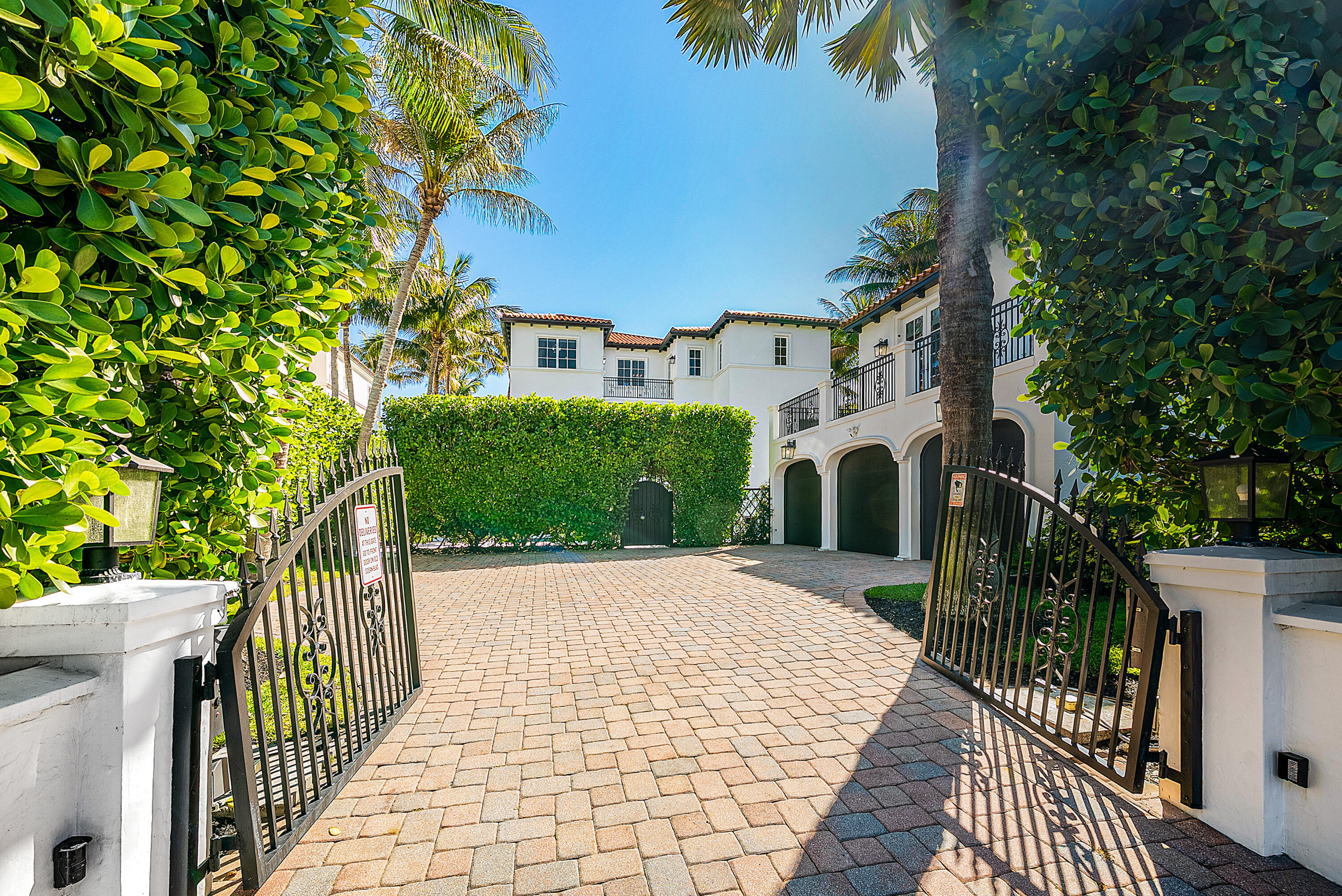 6102 North Ocean Boulevard Ocean Ridge, FL 33435 - Photo 6 of 86 A1A Gate Entrance/Garage