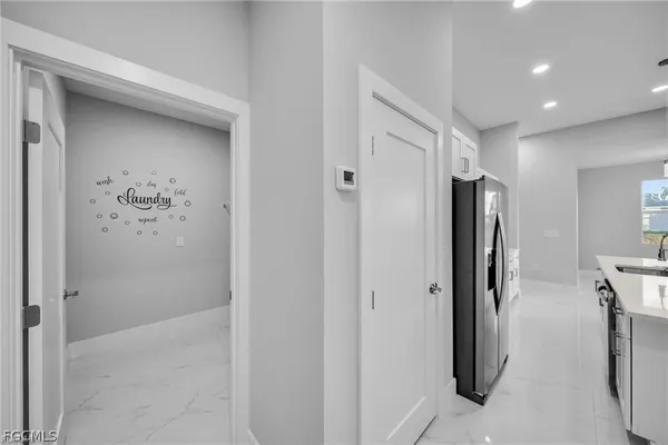 a bathroom with a shower and a mirror